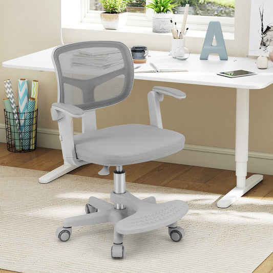 The kids desk chair is shown next to a white desk in a bright room setting