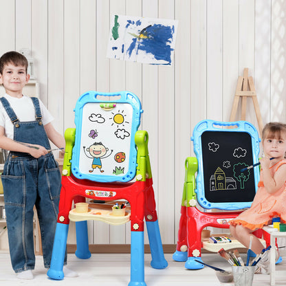 Two children play with the art easels in a room with art supplies around them