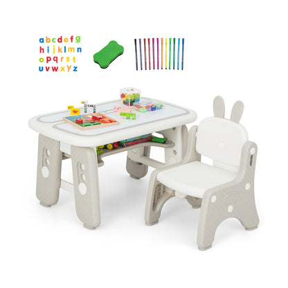The grey kids table and chair set includes alphabet magnets, pens and a whiteboard