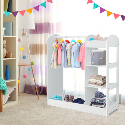 The white kids dress up storage unit with mirror, shown in a child's bedroom with toys and decorations