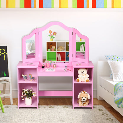Pink kids vanity table with mirror and storage shelves in a child's bedroom
