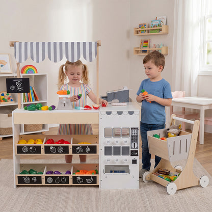 Two children playing with the grocery store playset and shopping cart