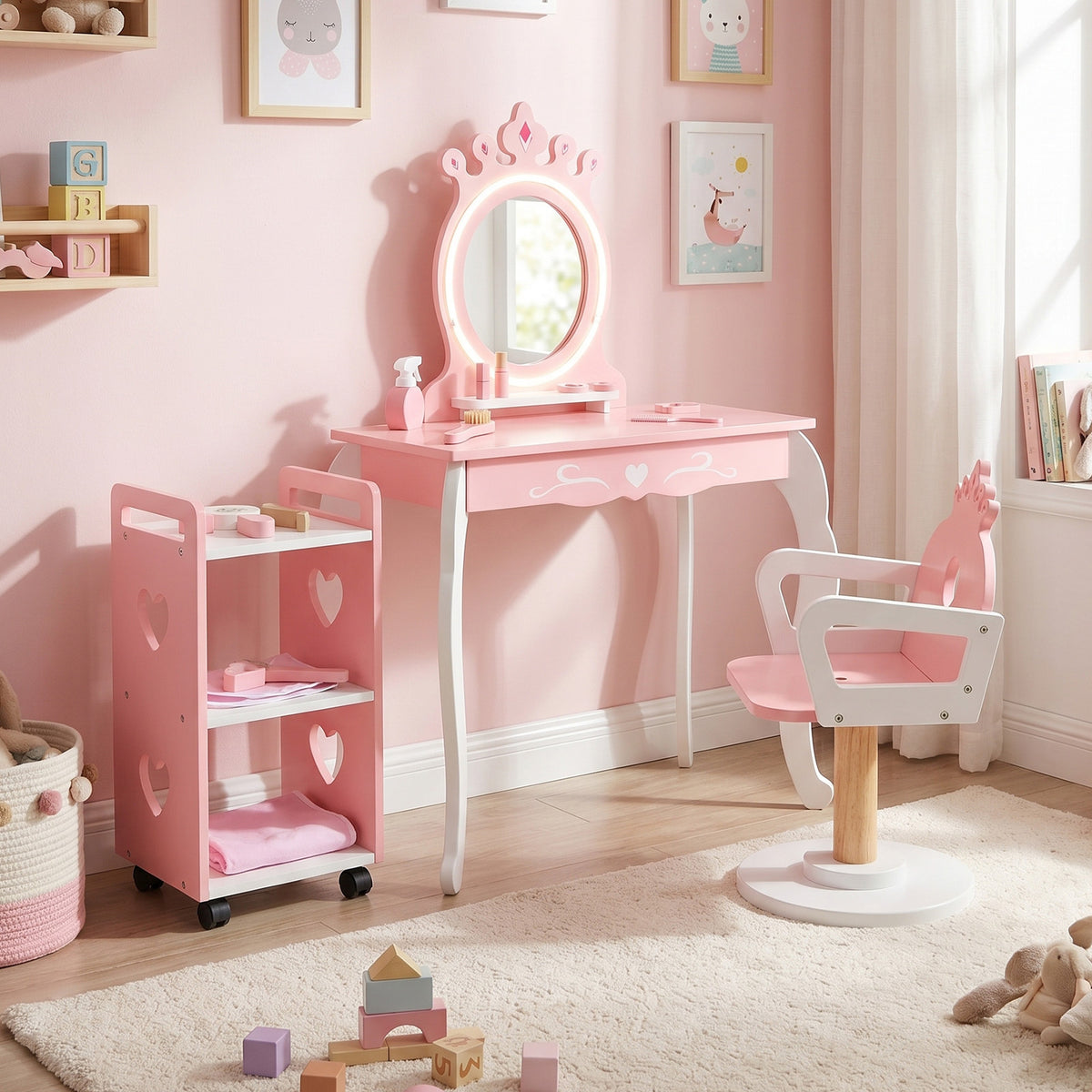 The kids vanities set arranged in a bedroom with a mirror, chair and a storage trolley