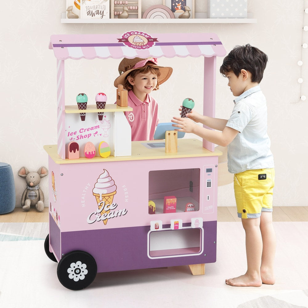 Children playing with the pink ice cream cart truck pretend play set