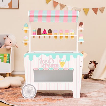 The kids ice cream cart with unique canopy set up in a child's bedroom with toys around