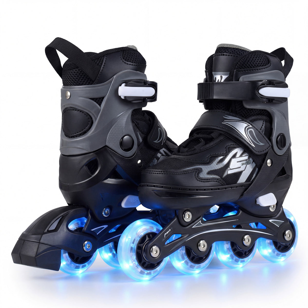 Kids Inline Skates in grey and black with illuminated wheels shown from the side