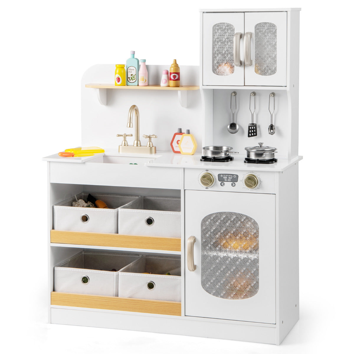 The white play kitchen with four fabric drawers and various toy accessories on display