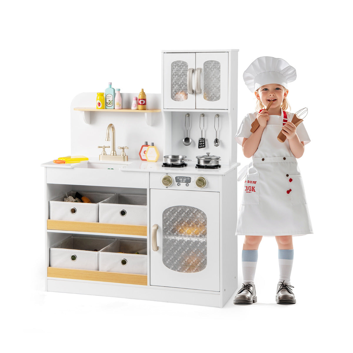 Kids Kitchen Playset Toy with a child dressed as a chef standing next to the white unit