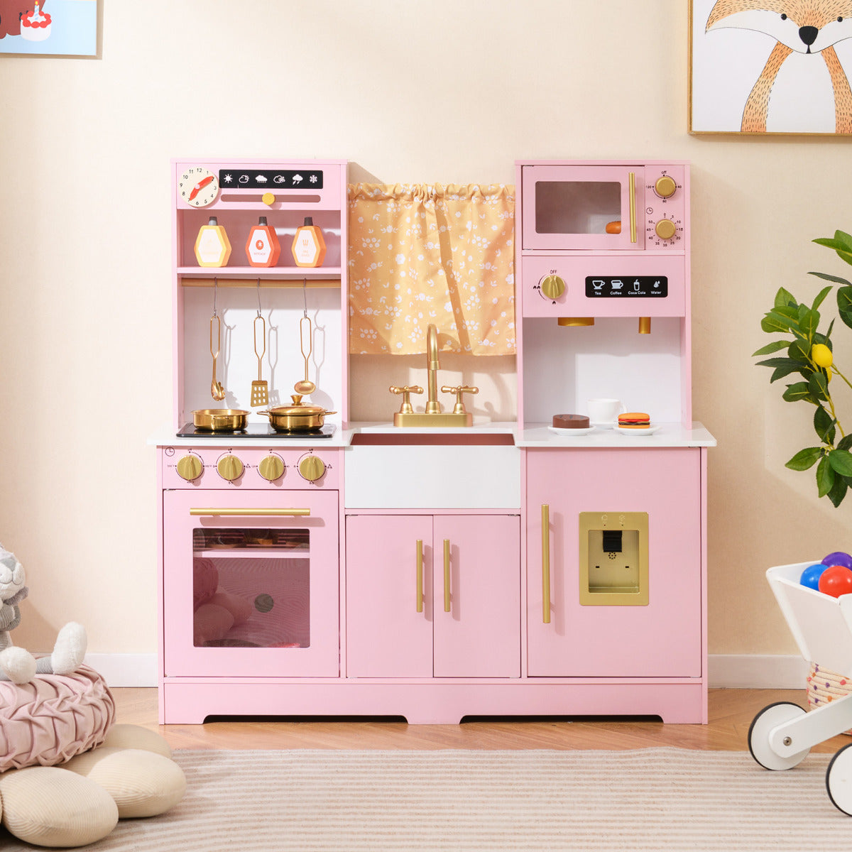 The play kitchen set placed in a bright room with a rug and decorative wall art nearby