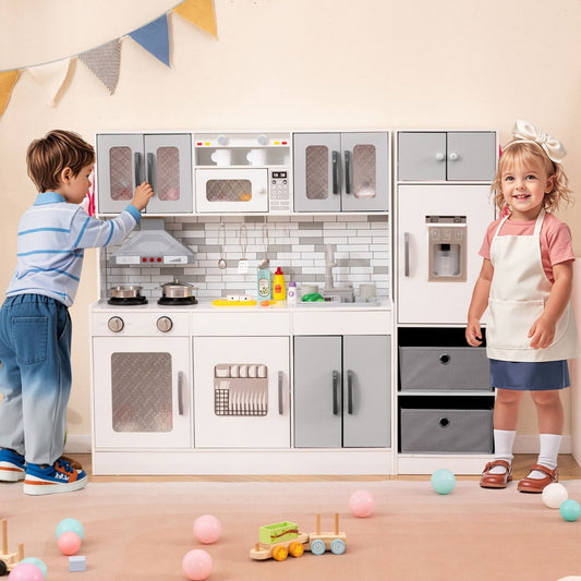 The play kitchen set is shown with two children interacting with it, one on the left and one on the right