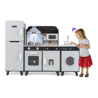 A young girl wearing a red spotted dress and a patriotic headband plays with the brown wooden play kitchen set