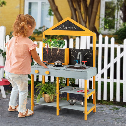 A young girl plays with the blue and yellow kids kitchen playset outdoors