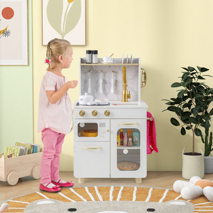 The play kitchen set standing in a bright nursery room next to a young girl playing