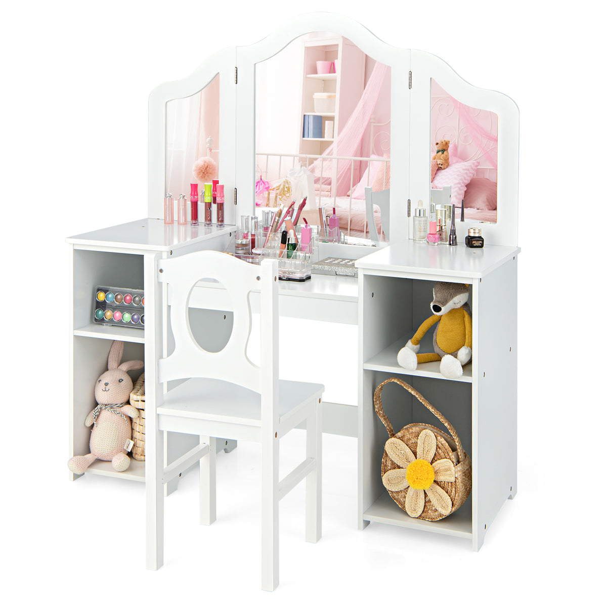 The white kids vanity table and chair set is decorated with toys and accessories