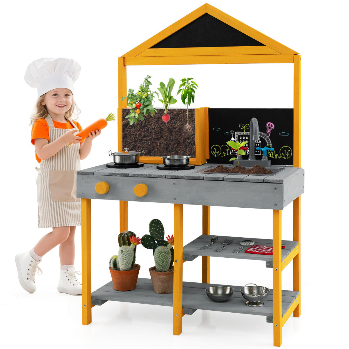 A girl wearing a chef's hat plays with the outdoor kitchen playset