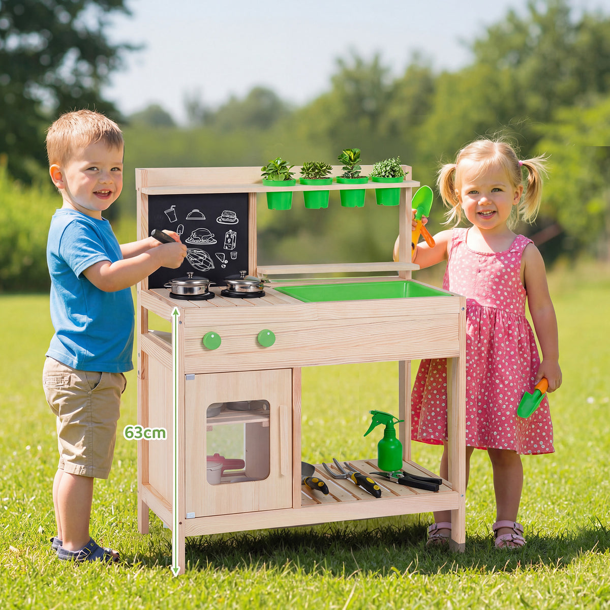 Two children playing together with the wooden play kitchen set outdoors