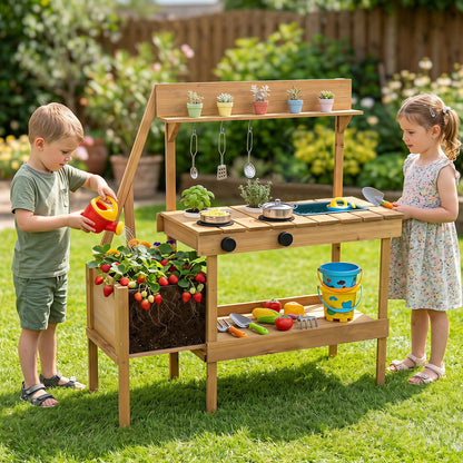 Two children playing with the outdoor mud kitchen, one watering plants in the planter