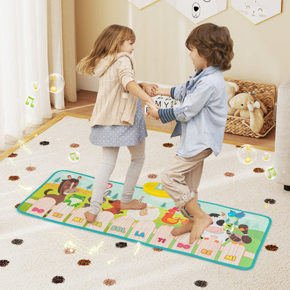 The musical floor mat with two children dancing together on the colourful piano keys