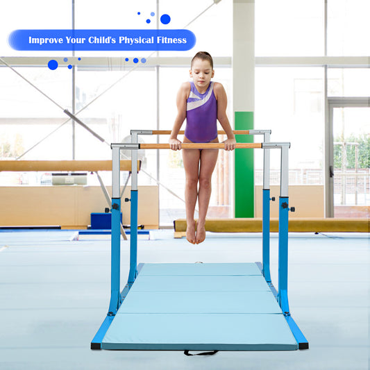 A young girl uses the blue gymnastics bar in a gym setting