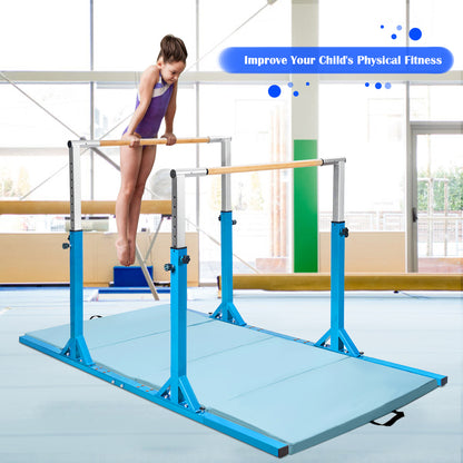 The blue parallel gymnastics bar is set up with a mat in a gym