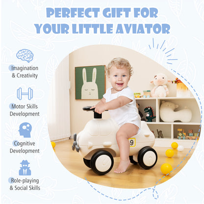 A toddler playing on the push and pedal ride on toy in a nursery with educational benefits listed