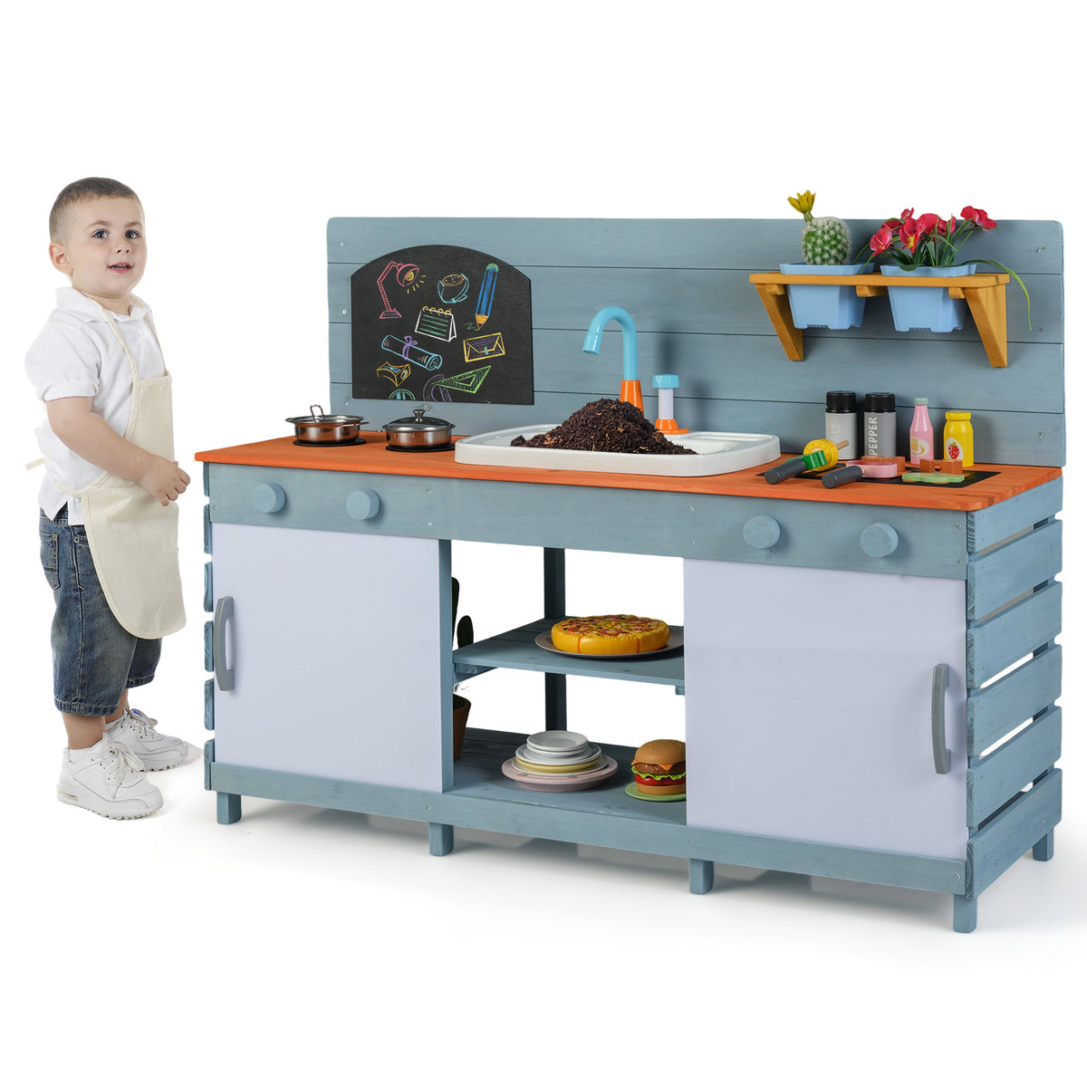 Kids Play Kitchen Set with a young boy standing beside the blue wooden unit