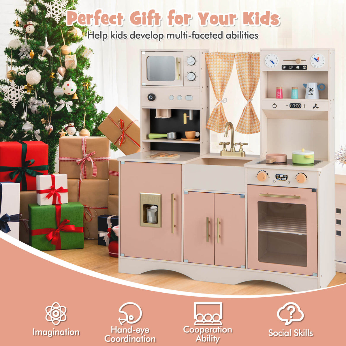 Pink wooden play kitchen set in a festive room with Christmas tree and presents