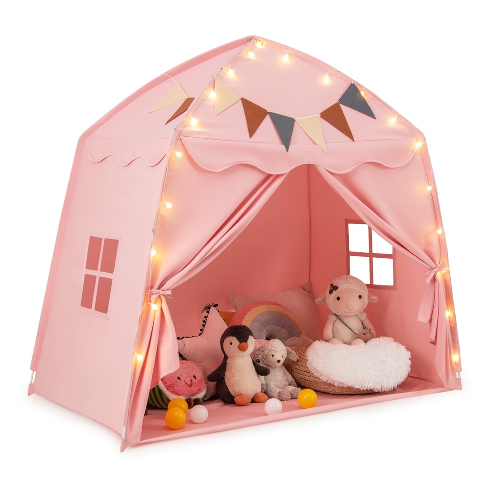 Kids Play Tent Bed Extra Large with lights and bunting, set up indoors with toys