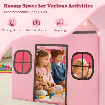 Children playing inside the pink playhouse, reading books and napping