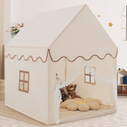 The beige play tent with padded mat, showing the entrance with lace curtains