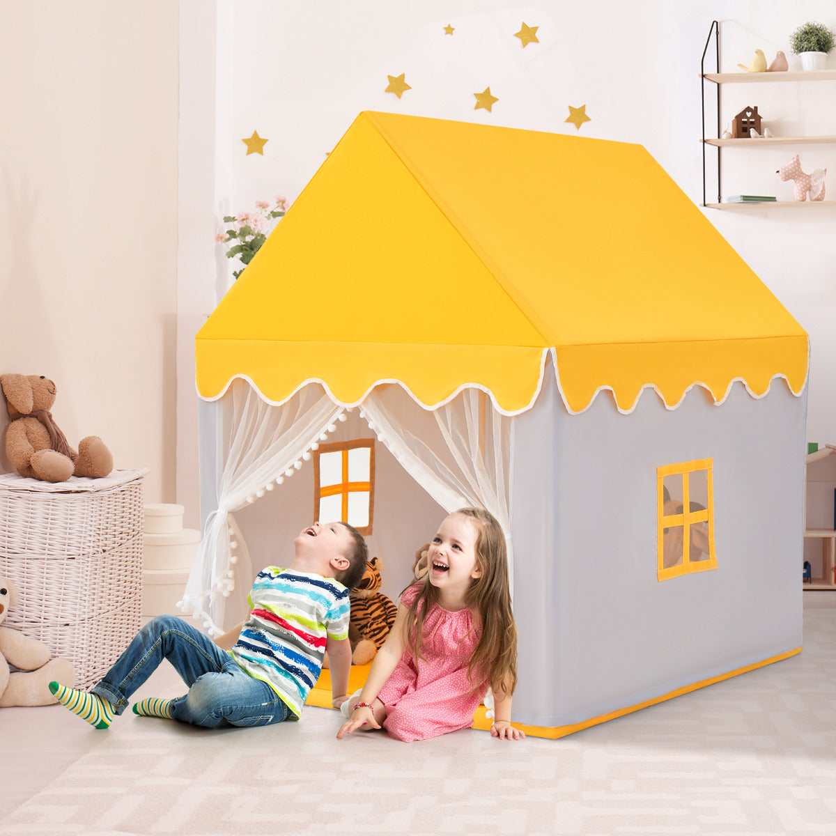 The play tent in use with two children laughing inside a room