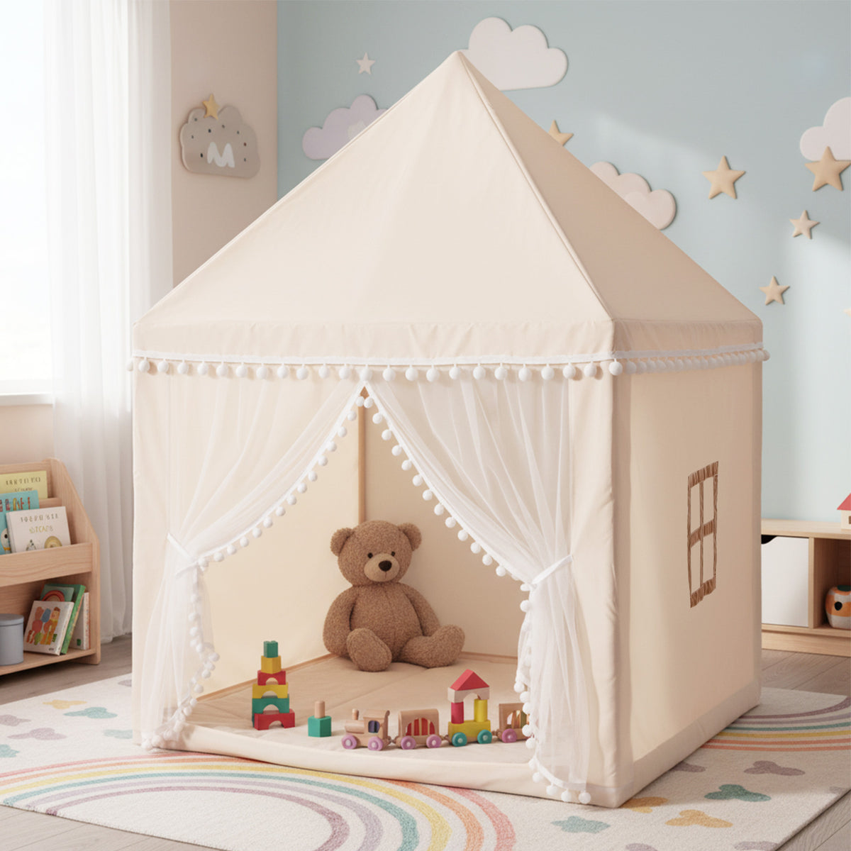 The play tent with a teddy bear and wooden toys inside, set up in a child's bedroom