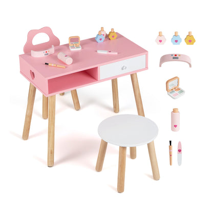 The kids table and chair set displayed with all the included wooden manicure toy pieces