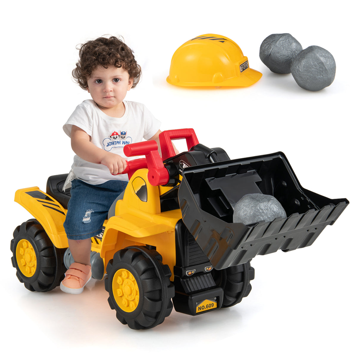 The ride on toy with a child sitting on the seat and accessories nearby