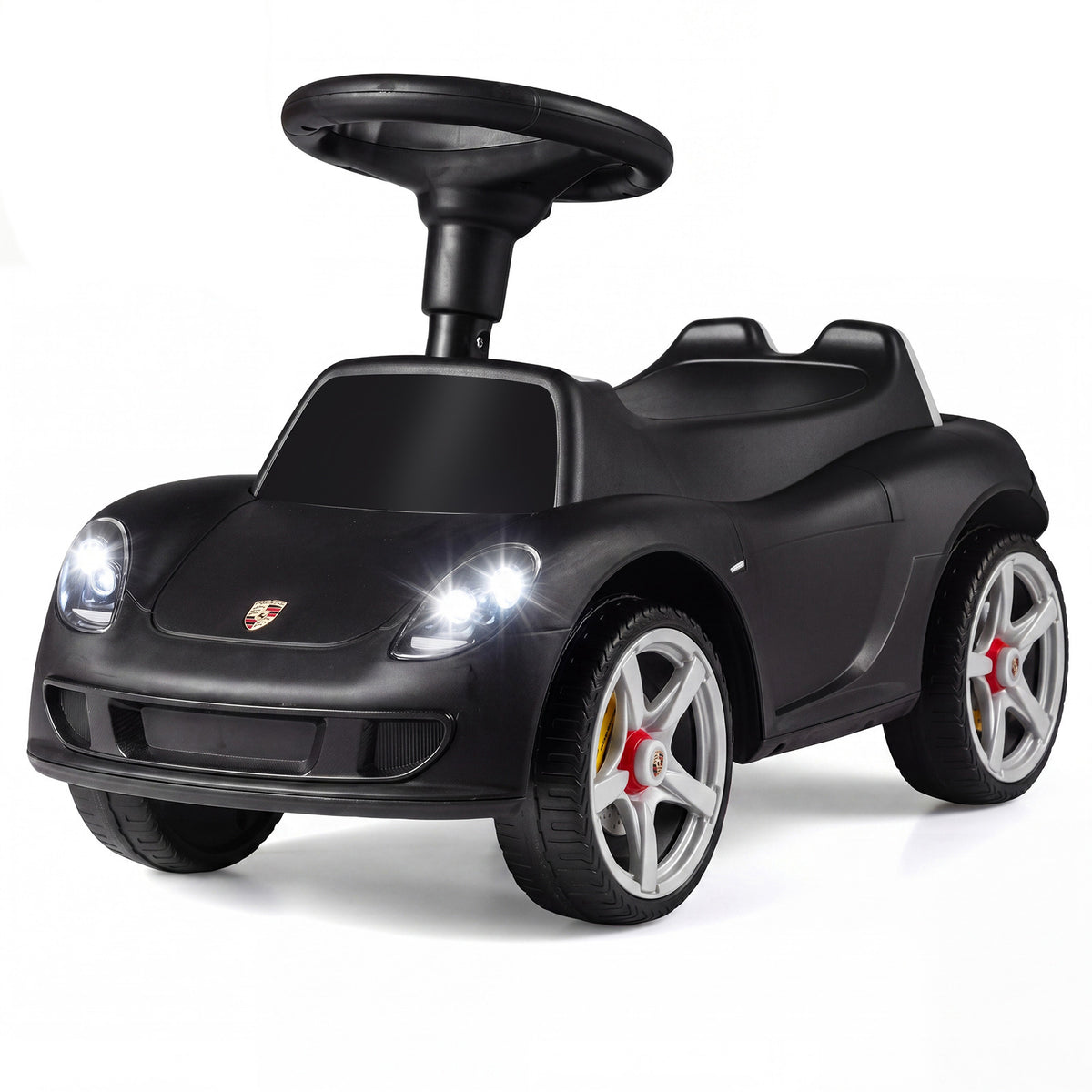 Black Porsche style sliding car with headlights on, shown from the front