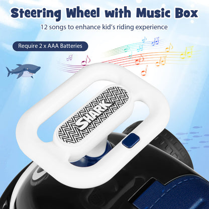 Close-up of the steering wheel with music notes on the black and blue sliding toy car