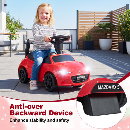 The sliding toy on a patio with an inset showing the anti-over backward safety device