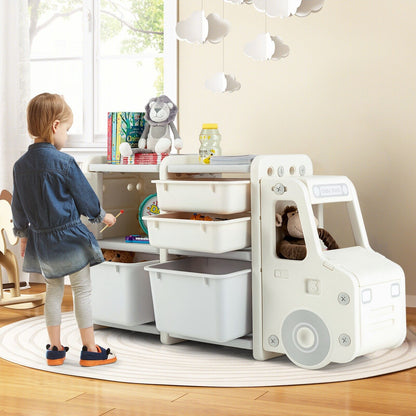 Kids storage unit in a child's bedroom, a young girl is placing toys into the storage bins
