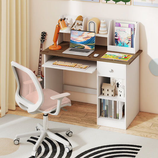 The student desk in a child's bedroom with a laptop and chair