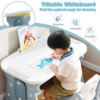 A young boy draws on the tiltable whiteboard of the blue kids table