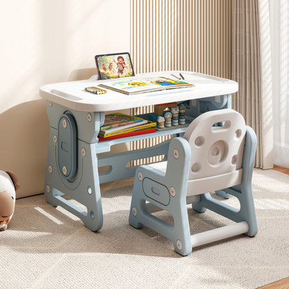 A blue kids table and chair set is displayed in a living room setting