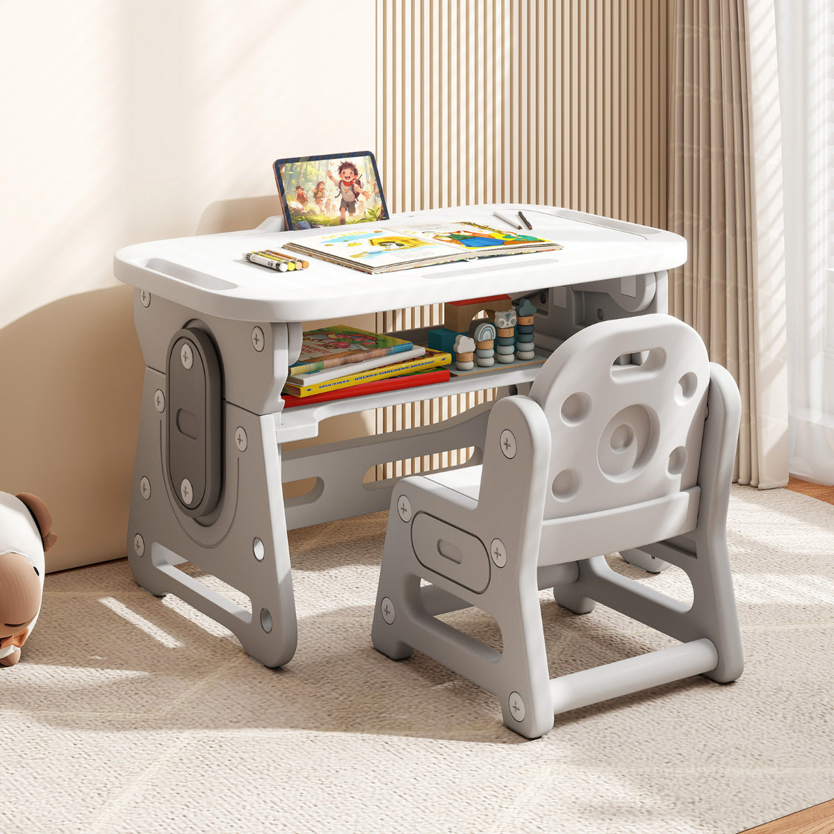 The kids table and chair set viewed from the side showing the storage shelf under the desk