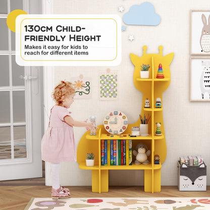 A young child reaching for a toy on the yellow giraffe toy storage unit