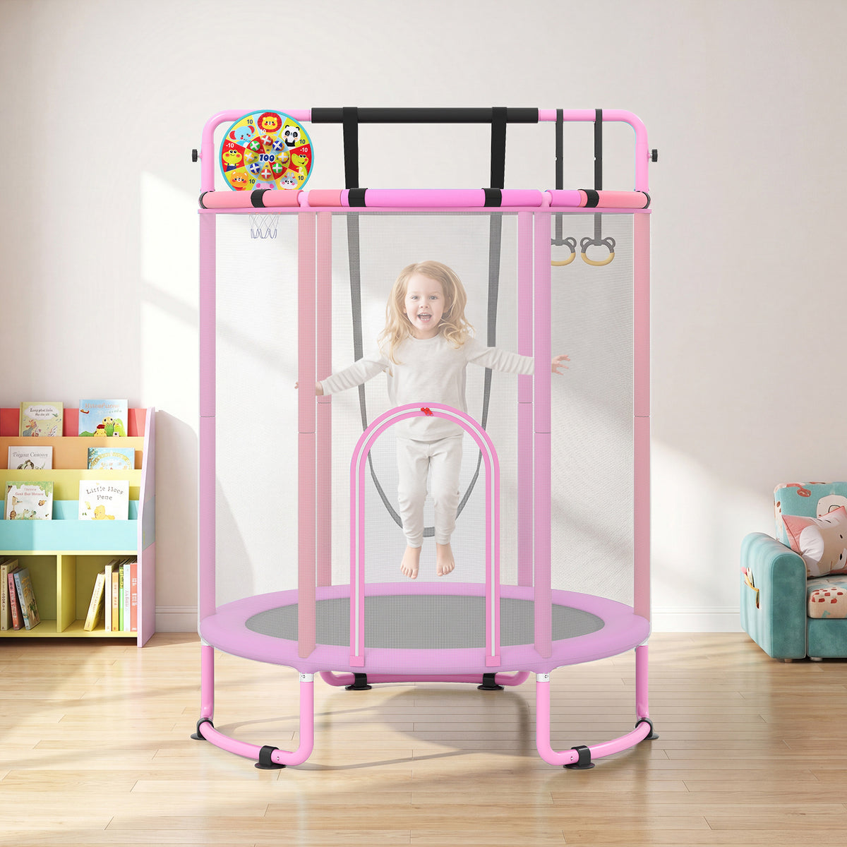 A child jumping inside the purple trampoline with a safety net in a bright playroom