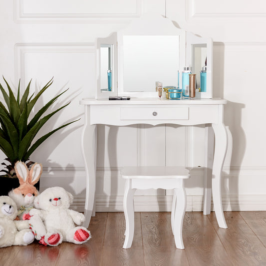 White dressing table with stool set up in a room with toys and plants