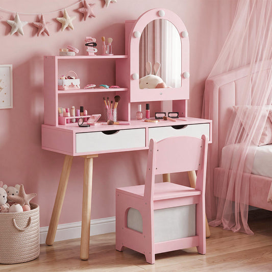 The pink kids vanity dressing desk with drawers and chair set up in a child's bedroom
