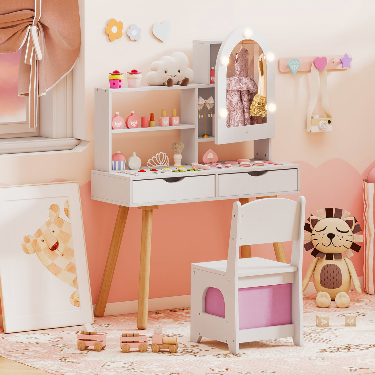 The dressing table set positioned against a wall with decorative wall hooks and a bear poster