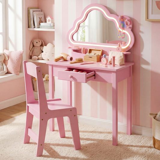 The pink kids vanity set with the drawer slightly open and accessories on top