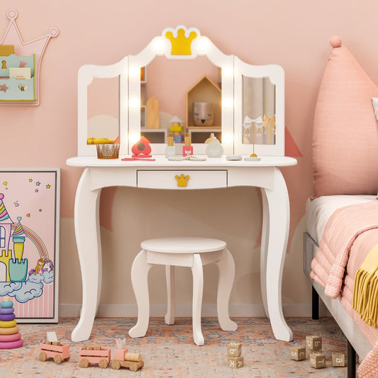 The kids vanity set placed in a bedroom next to a bed with toys on the floor