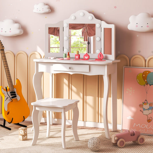 The kids vanity set placed in a bedroom with a guitar and toys on the floor